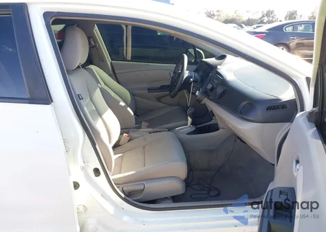 2012 Honda Insight from USA, damaged, VIN JHMZE2H3XCS000243